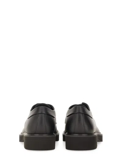 Ferragamo Elegant Derby Dress Shoes With Unique Ornamentation In Black