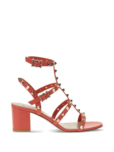 Valentino Garavani Red Leather Rockstud Sandal With Pyramid Studs And Block Heel In Red
