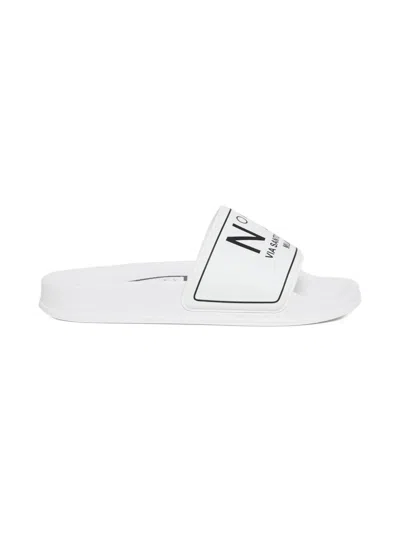 N°21 Logo Slides In White