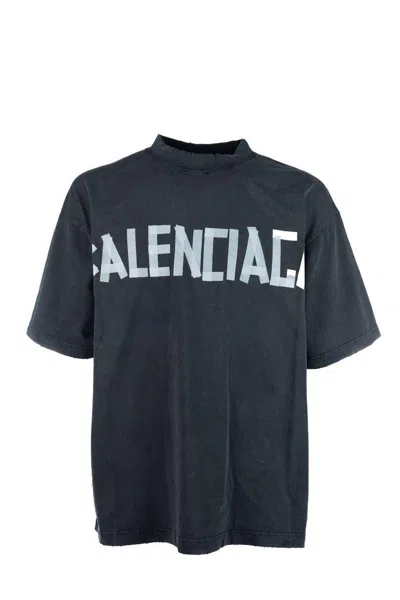 Balenciaga Black T-shirt With Lettering Logo Printed On The Front And Back In Cotton Man In Faded Washed Black