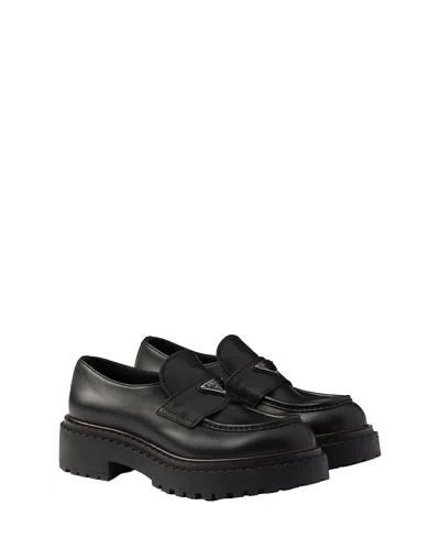Prada Triangle Logo Brushed Leather Loafers In Black