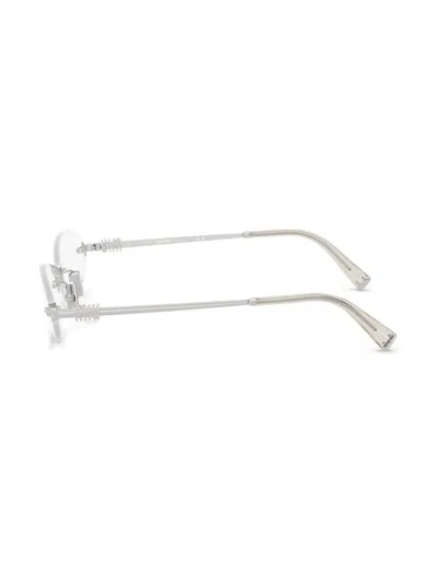 Miu Miu Runde Brille Mit Logo-schild In Silber