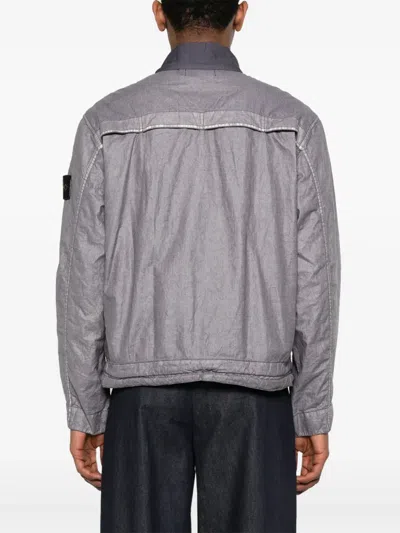 Stone Island Jacket With Transparent Resins And Foldable Co11ar In Blue