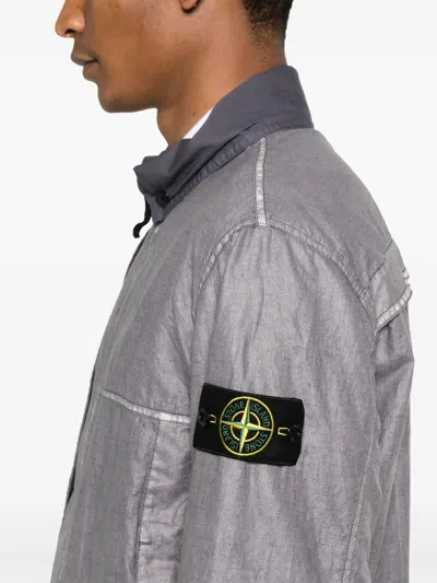 Stone Island Jacket With Transparent Resins And Foldable Co11ar In Blue