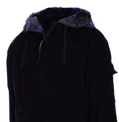 C.p. Company Blue Jacket With Explorer Hood And Adjustable Drawstring Waist In Tech Fabric Man In Black