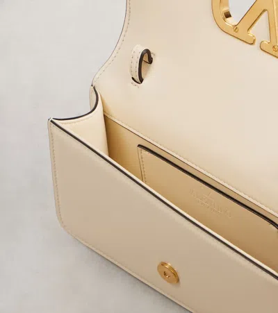 Valentino Garavani Small Leather Clutch With Adjustable Chain Strap In White