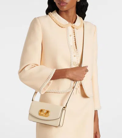 Valentino Garavani Small Leather Clutch With Adjustable Chain Strap In White