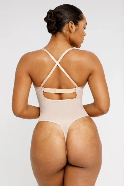 Shapellx Airslim Deep Plunge Low-back Thong Bodysuit In Buttercream