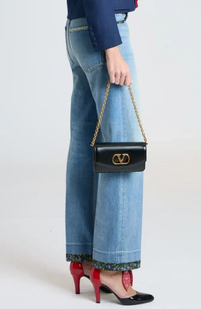 Valentino Garavani Vain Small Vlogo Leather Clutch Bag In Black