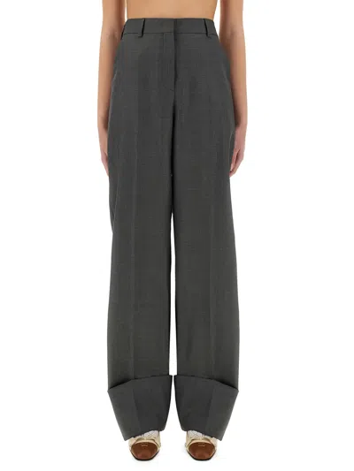 Valentino Wide Leg Wool Pants Featuring Pockets In Gray