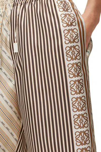 Loewe Anagram-motif Silk Shorts In Nude