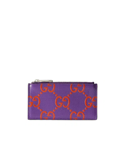 Gucci Gg-embossed Zipped Cardholder In Purple