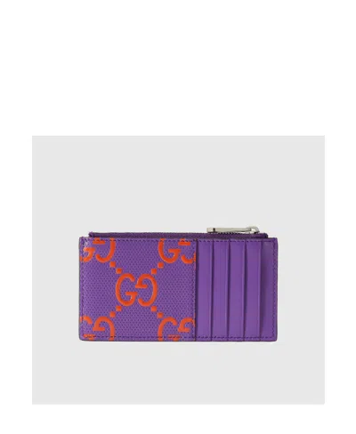 Gucci Gg-embossed Zipped Cardholder In Purple