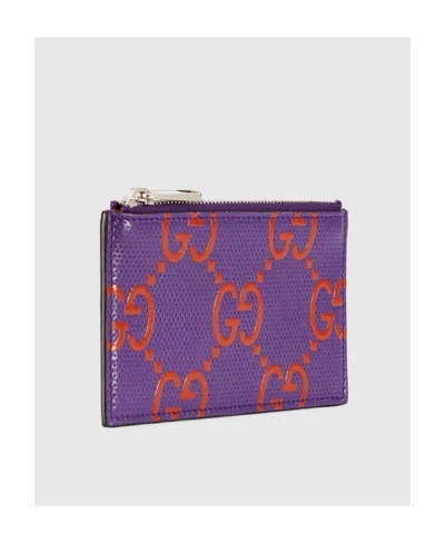 Gucci Gg-embossed Zipped Cardholder In Purple