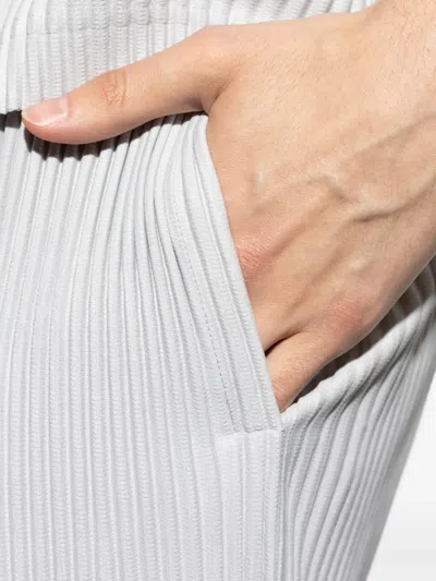 Issey Miyake Pleated Trousers With Elasticated Waistband And Ribbed Texture