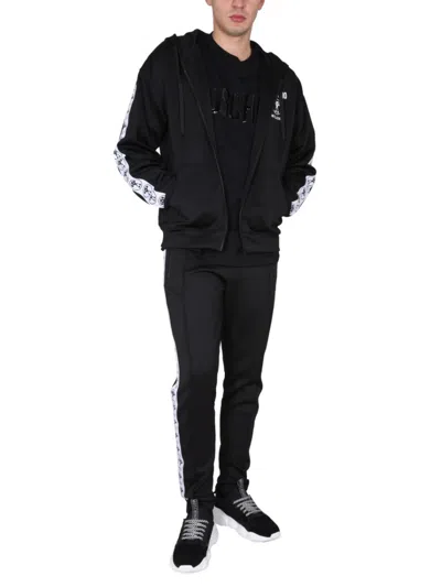 Moschino Jogging Pants With Adjustable Drawstring And Zippered Pockets