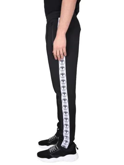 Moschino Jogging Pants With Adjustable Drawstring And Zippered Pockets