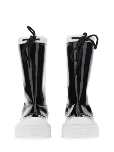 Moschino Glossy High-shaft Boots With Contrasting Sole