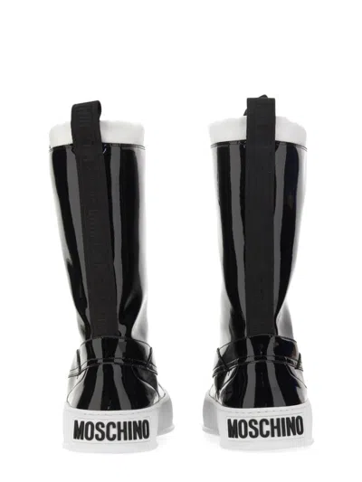 Moschino Glossy High-shaft Boots With Contrasting Sole