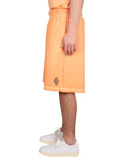 Marcelo Burlon County Of Milan Marcelo Burlon Bermuda With Logo In Orange