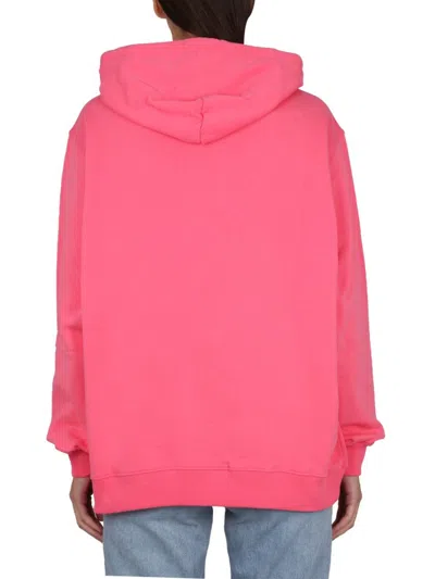 Msgm Vibrant Sweatshirt With Drawstring Hood And Playful Graphic In Pink