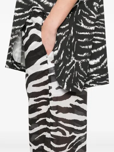 Shop Attico Zebra-print Sheer Trousers