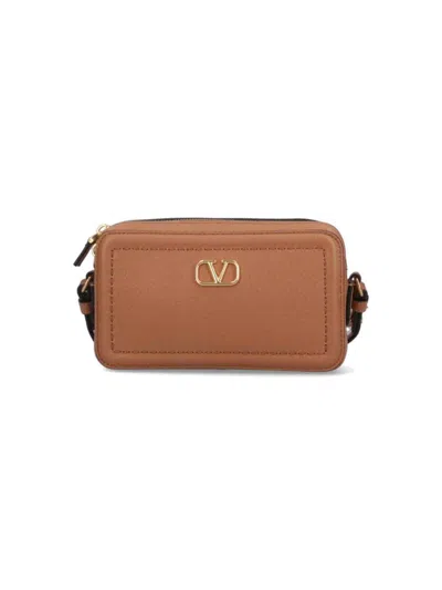 Valentino Garavani Mini Leather Crossbody Bag With Adjustable Strap In Brown