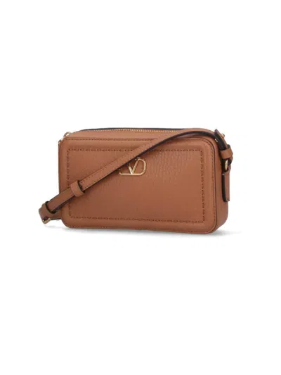 Valentino Garavani Mini Leather Crossbody Bag With Adjustable Strap In Brown