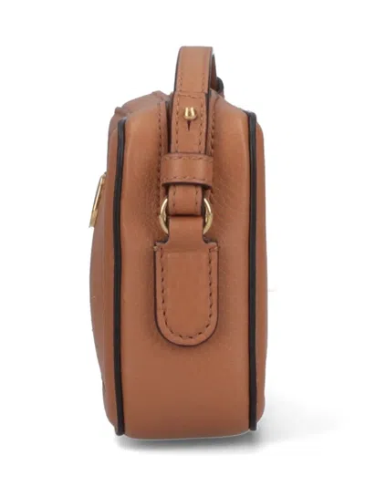 Valentino Garavani Mini Leather Crossbody Bag With Adjustable Strap In Brown