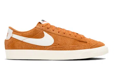 Pre-owned Nike Blazer Low 77 (women's) Sneakers In Monarch/coconut Milk/dark Russet