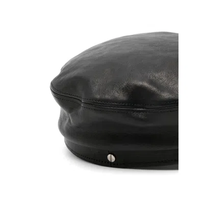 ANN DEMEULEMEESTER LEATHER HATS 