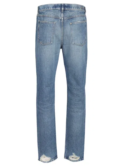 Givenchy Washed Denim Tapered Leg Jeans With Contrast Stitching