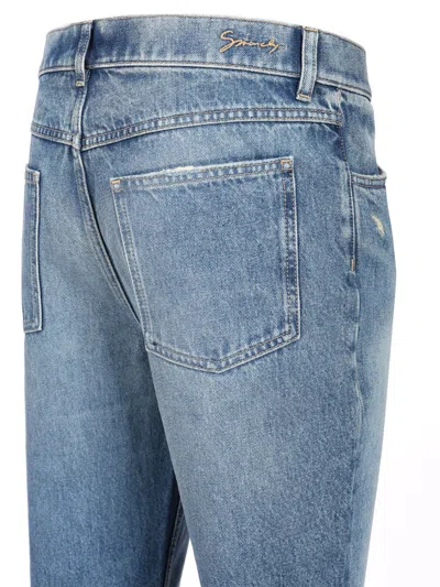 Givenchy Washed Denim Tapered Leg Jeans With Contrast Stitching