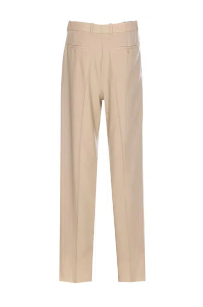 Saint Laurent Trousers With Front Pleats And Back Pockets