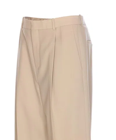 Saint Laurent Trousers With Front Pleats And Back Pockets
