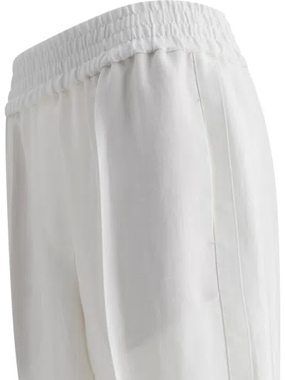 Brunello Cucinelli Pressed Crease Tapered Leg Trousers In White