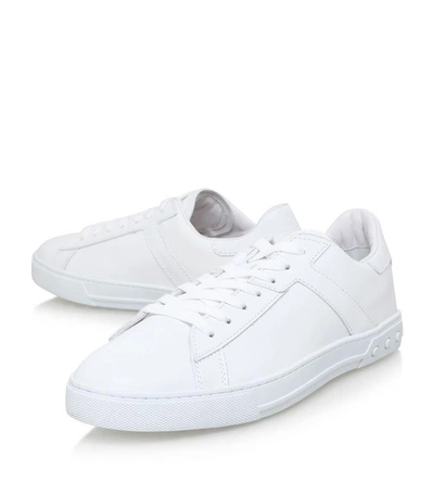 Shop Tod's Leather Tennis Sneakers