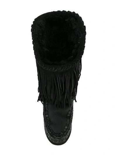 fringed tall boots