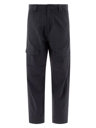 C.p. Company Streamlined Black Cargo Pants With Functional Pockets And Logo Detail