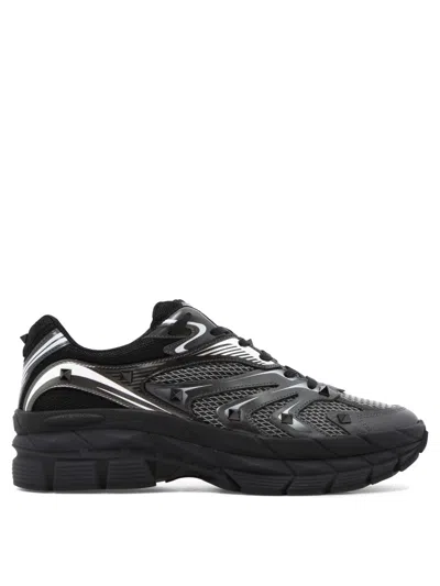Valentino Garavani Leather Sneakers With Textured Rubber Elements In Black