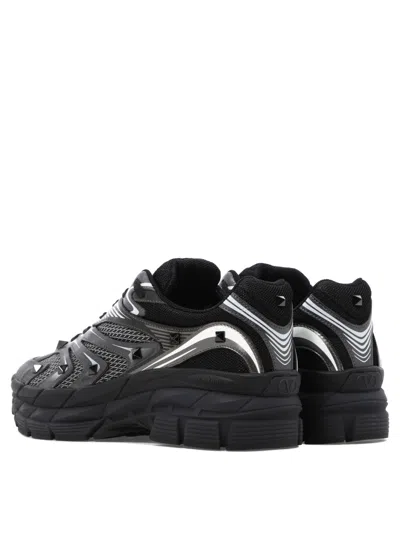 Valentino Garavani Leather Sneakers With Textured Rubber Elements In Black