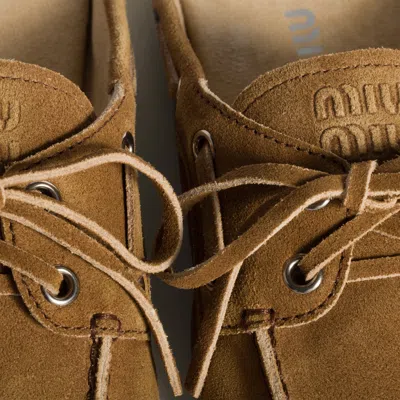 Miu Miu Faded Suede Mules In Gold