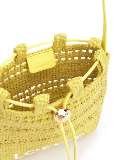 Loewe Raffia Drawstring Shoulder Bag In Yellow