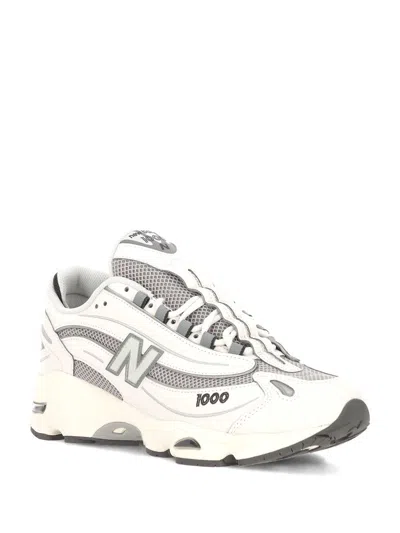 New Balance Grey Low Top Sneakers With Logo Patch On Side And Tongue And Perforated Panels