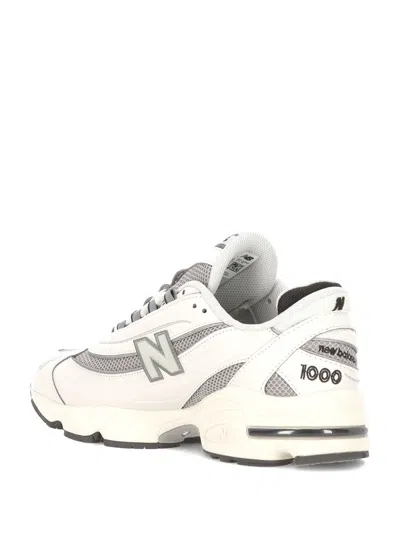 New Balance Grey Low Top Sneakers With Logo Patch On Side And Tongue And Perforated Panels