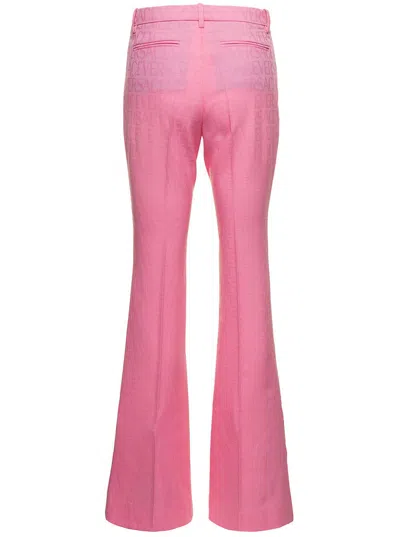 Versace Pink Flare Pants With Tonal Logo Lettering In Wool Woman In Pink