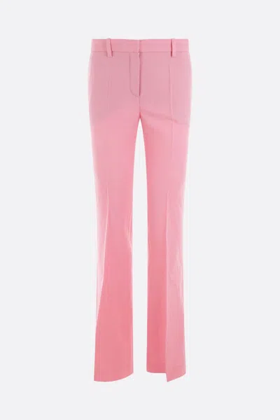 Versace Pink Flare Pants With Tonal Logo Lettering In Wool Woman In Pink