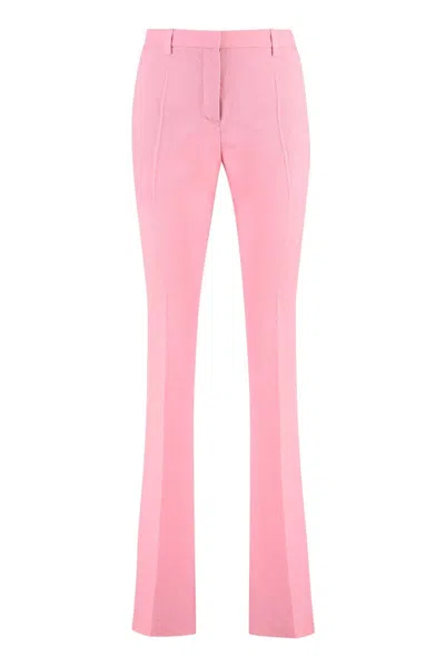 Versace Pink Flare Pants With Tonal Logo Lettering In Wool Woman In Pink