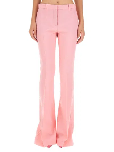 Versace Pink Flare Pants With Tonal Logo Lettering In Wool Woman In Pink