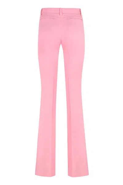Versace Pink Flare Pants With Tonal Logo Lettering In Wool Woman In Pink
